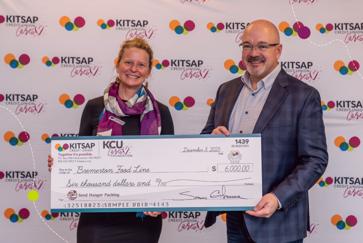 Bremerton Foodline and Shawn Gilfedder check presentation