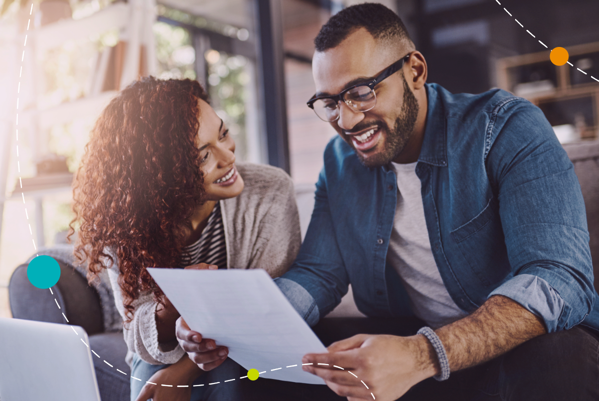 Happy couple planning finances 